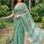 Sea green linen cotton blend saree with floral embroidery & tassel pallu