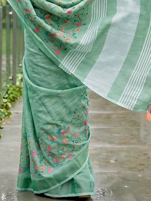 Sea green linen cotton blend saree with floral embroidery & tassel pallu 4