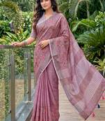 Onion pink linen cotton blend saree with floral embroidery & tassel pallu