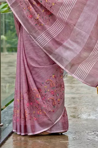 Onion pink linen cotton blend saree with floral embroidery & tassel pallu