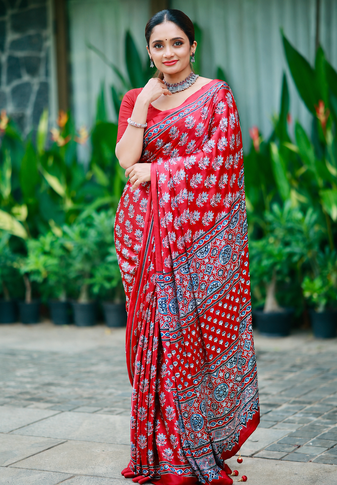 Red Color Ajarakh Print With Mirror Work And Latkan Satin Crepe Saree 