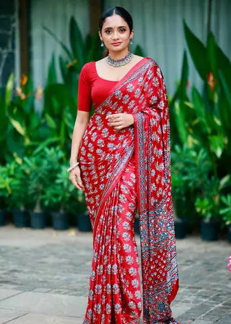 Red Color Ajarakh Print With Mirror Work And Latkan Satin Crepe Saree 