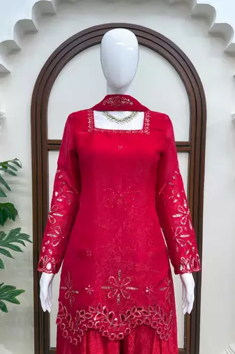 Rani color fendy silk blend embroidered kurta palazzo set with dupatta