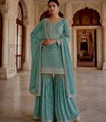 Sea green faux georgette embroidered sharara suit set with dupatta