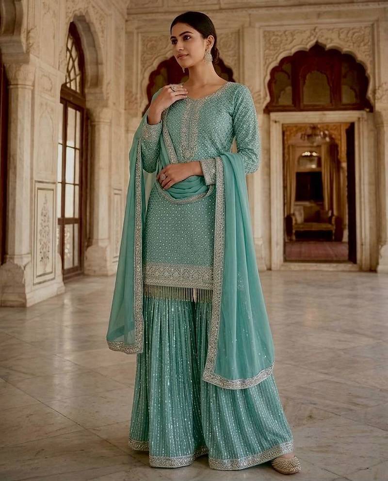 Sea green faux georgette embroidered sharara suit set with dupatta