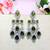 Green designer premium festive wear earrings