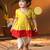 Girls' yellow and cream dhoti kurta set