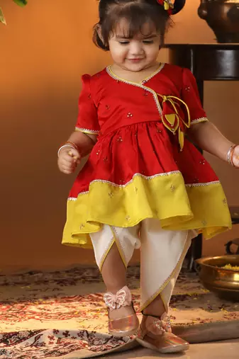 Girls' red and cream dhoti kurta set