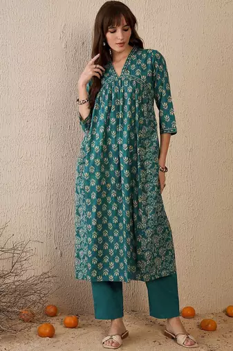 Women Floral Printed Empire  Cotton Kurta with Trousers & With Dupatta