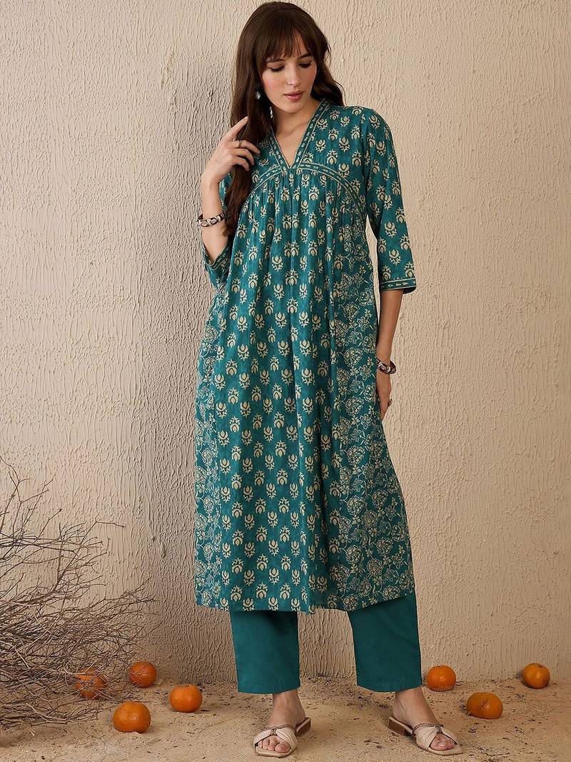Women Floral Printed Empire  Cotton Kurta with Trousers & With Dupatta