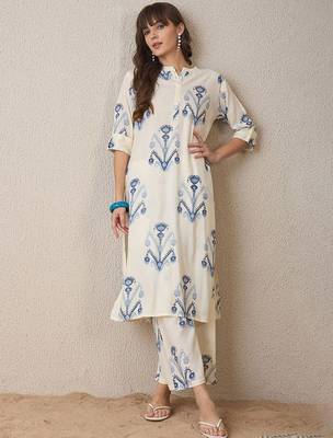 Women Printed Regular Kurta with Trousers 2