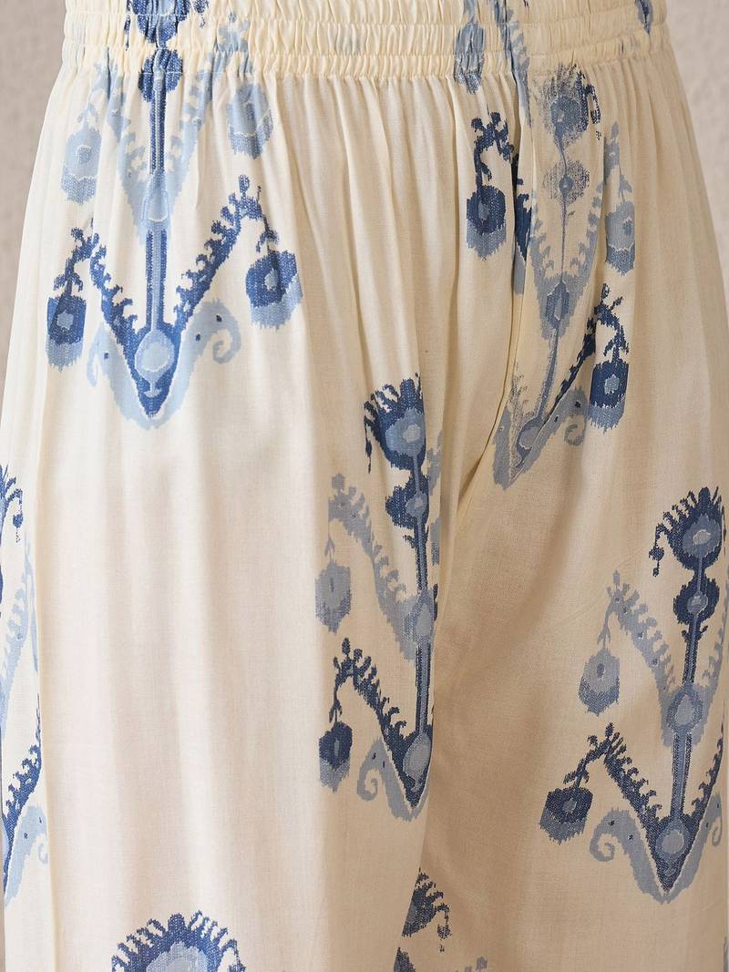 Women Printed Regular Kurta with Trousers