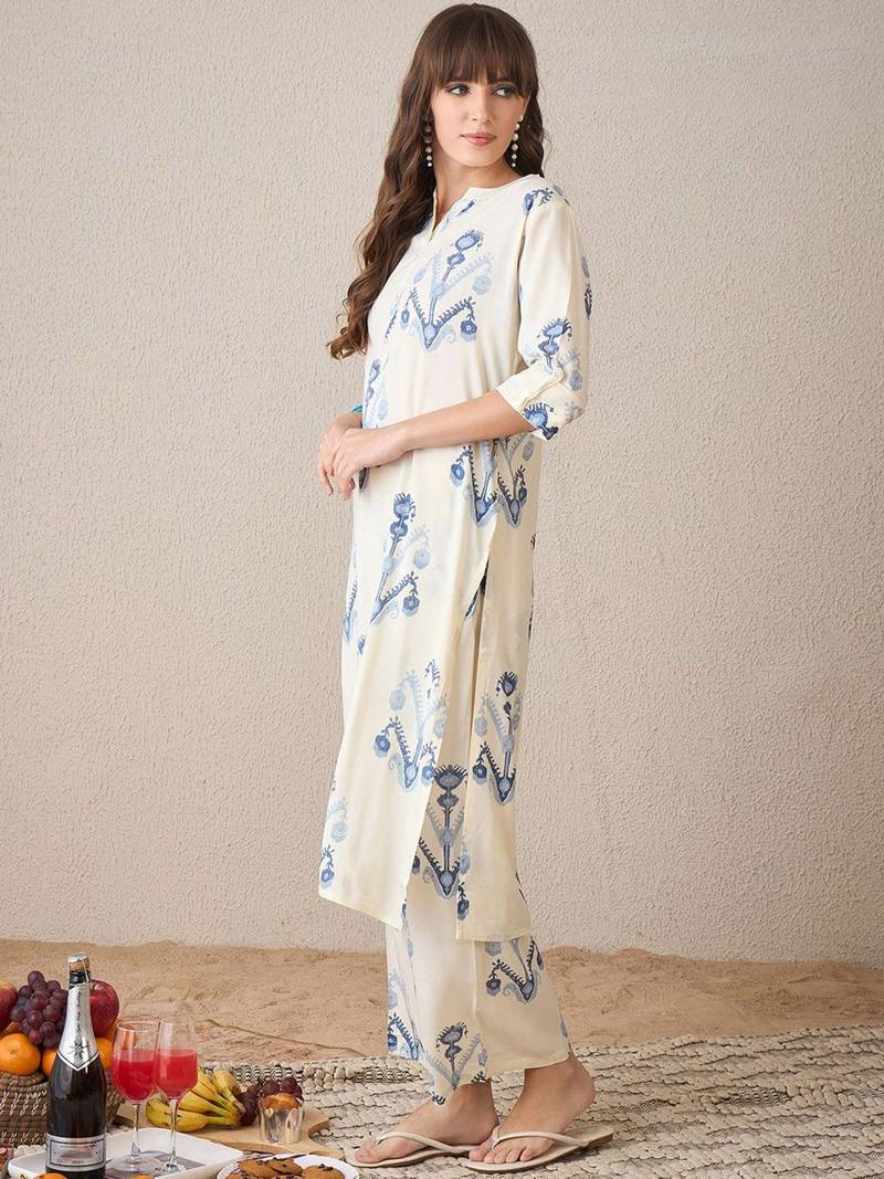 Women Printed Regular Kurta with Trousers