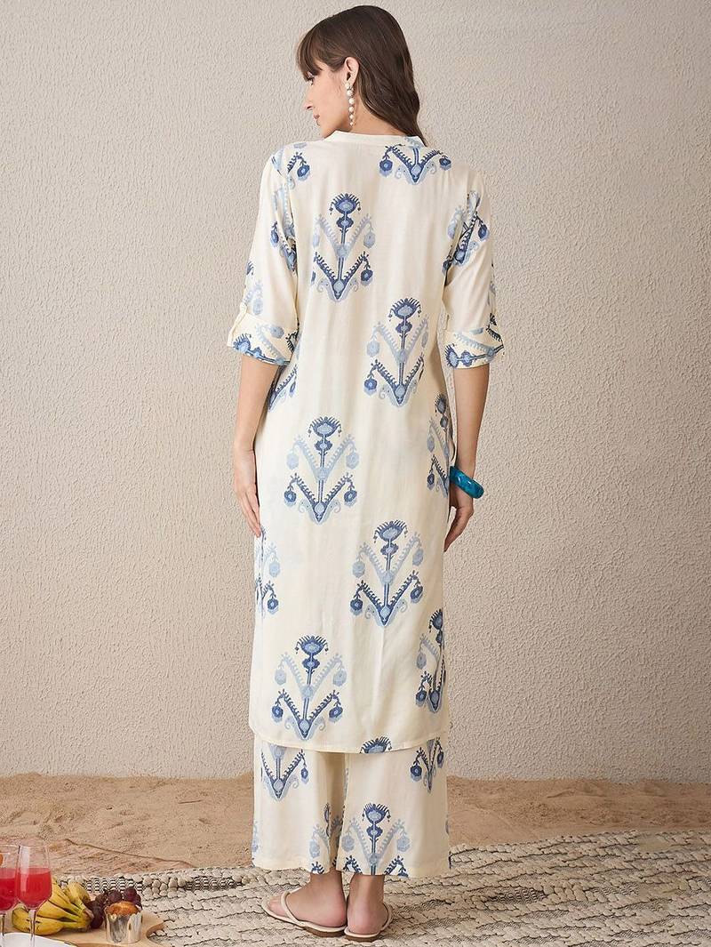 Women Printed Regular Kurta with Trousers