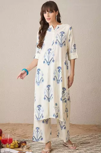 Women Printed Regular Kurta with Trousers