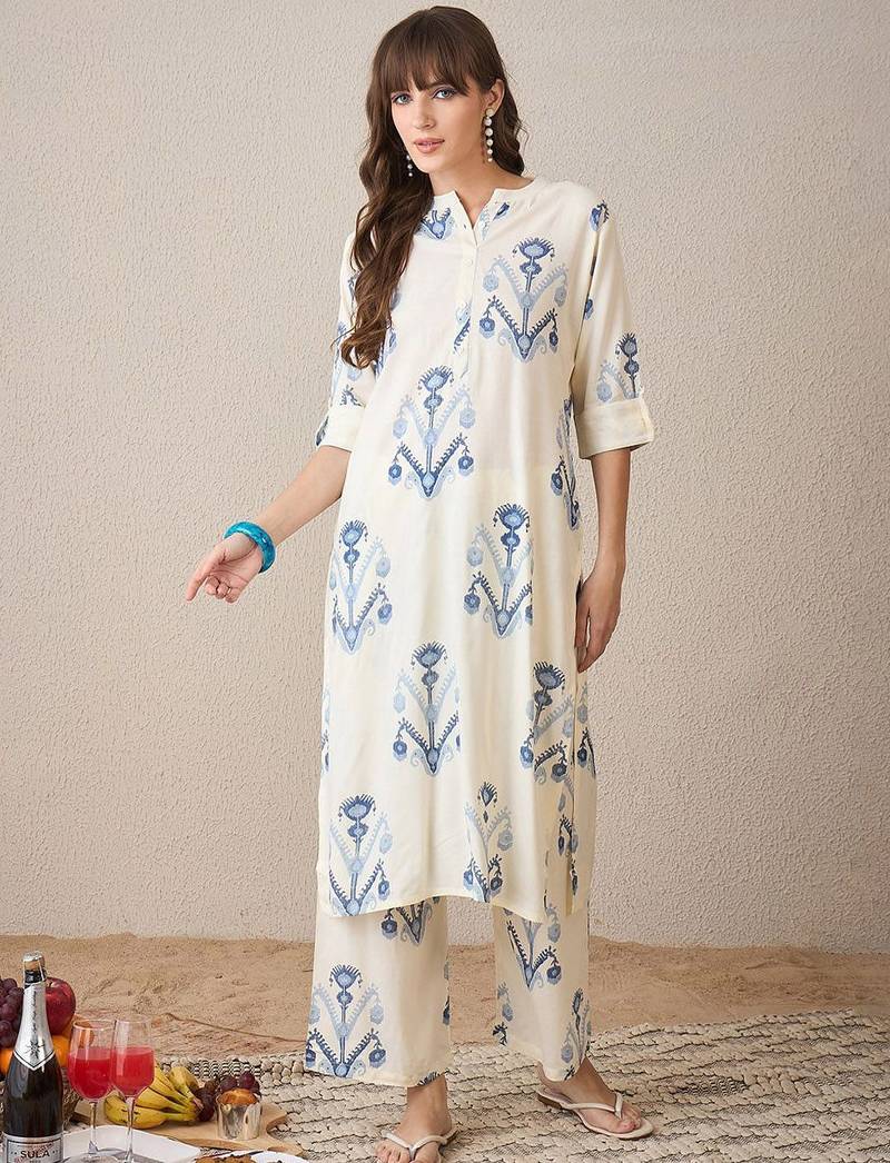 Women Printed Regular Kurta with Trousers