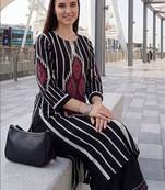 Women Printed Regular  Cotton Kurta with Palazzos