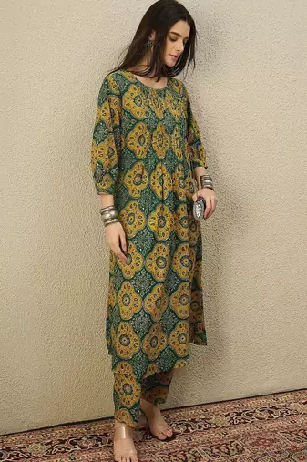 Women Ethnic Motifs Printed Pleated  Cotton Kurta with Trousers