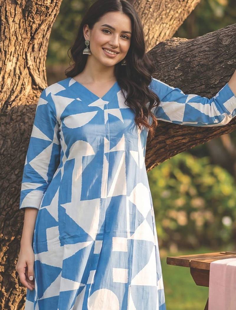 Women Printed Regular  Cotton Kurta with Trousers