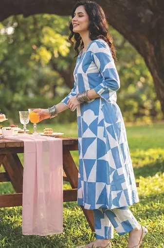 Women Printed Regular  Cotton Kurta with Trousers
