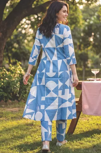 Women Printed Regular  Cotton Kurta with Trousers