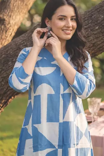 Women Printed Regular  Cotton Kurta with Trousers