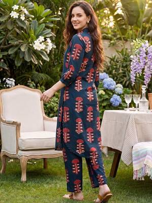 Women Ethnic Motifs Printed Regular  Cotton Kurta with Trousers 4