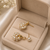 Freshwater pearl cluster drop earrings with gold-tone studs