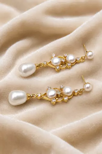 Pearl drop dangle earrings with crystal accents, gold tone