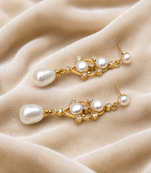 Pearl drop dangle earrings with crystal accents, gold tone