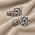 Grey baroque pearl cluster drop earrings with single pearl