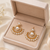 Pearl chandbali earrings with gold-tone hoop and crystal accents