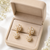Freshwater pearl cluster drop earrings with gold accents