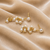 Natural freshwater pearl cluster drop earrings with gold-tone chain
