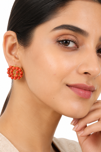 Coral bead stud earrings with gold twisted wire detail
