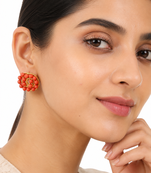 Coral bead stud earrings with gold twisted wire detail
