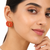 Coral bead stud earrings with gold twisted wire detail