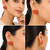 Coral bead stud earrings with gold twisted wire detail
