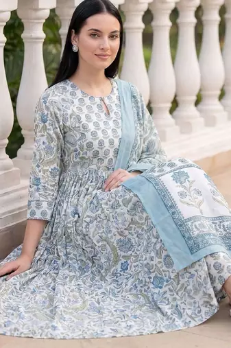 Women Floral Printed Empire  Cotton Kurta with Trousers & With Dupatta