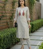 Women Printed Beads and Stones Cotton Kurta with Trousers