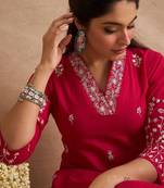 Women Ethnic Motifs Embroidered Cotton Kurta with Trousers