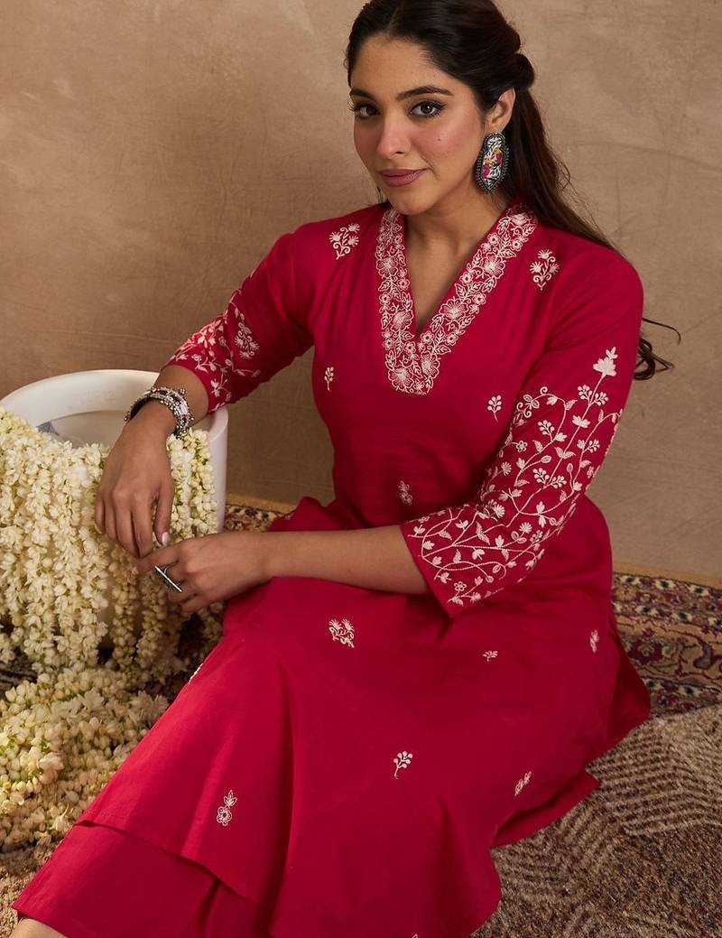 Women Ethnic Motifs Embroidered Cotton Kurta with Trousers