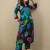 Women Floral Printed Regular  Cotton Kurta with Trousers