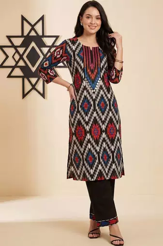 Women Printed Regular  Cotton Kurta with Trousers
