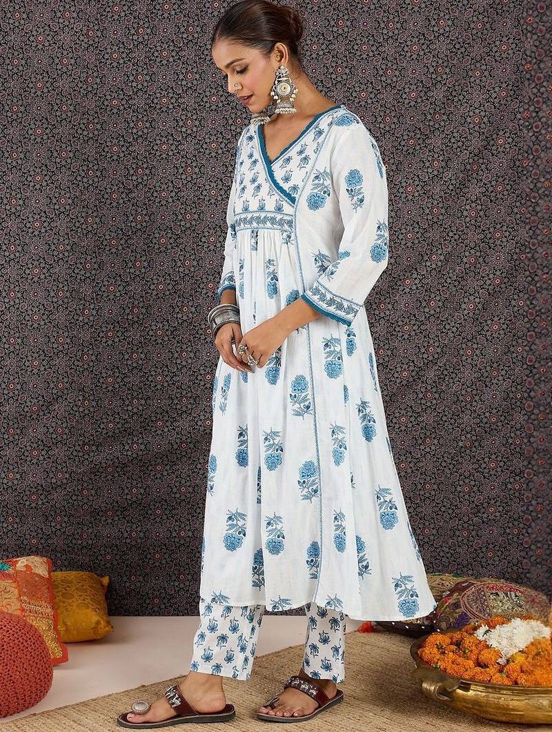 Women Floral Printed Regular  Cotton Kurta with Trousers