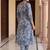 Women Floral Printed Pleated  Cotton Kurta with Trousers