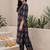 Women Printed Regular Kurta with Trousers