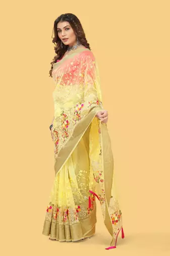 Yellow organza embroidered zari woven heavy look ethnic saree with blouse