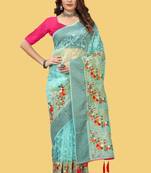 Teal organza embroidered zari woven heavy look ethnic saree with blouse