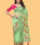 Green organza embroidered zari woven heavy look ethnic saree with blouse